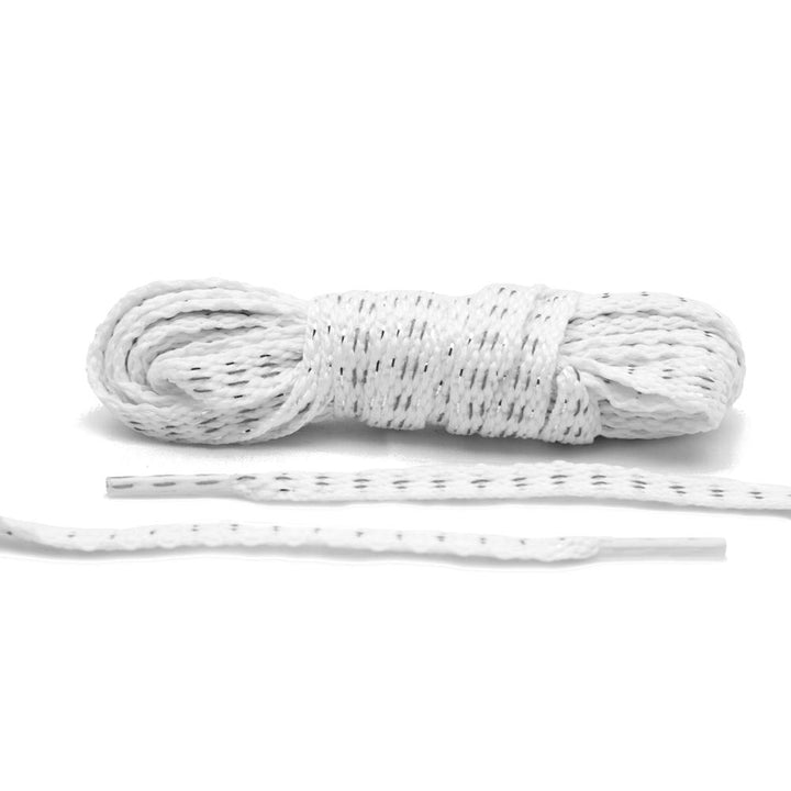 Individualize your sneakers with a  of Lace Lab Reflective Flat Laces in white.